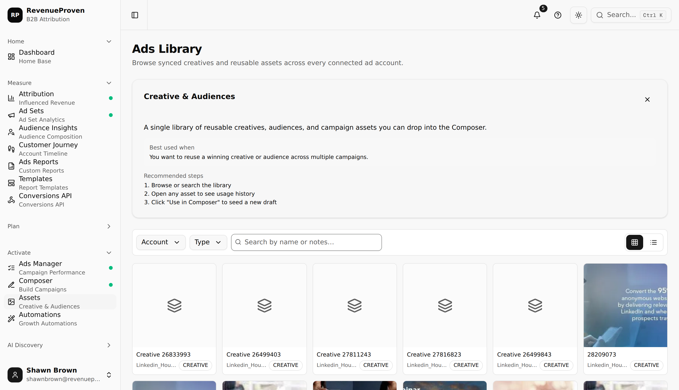 Ads Library showing a grid of creative assets with filter controls for type, status, source, and ad account