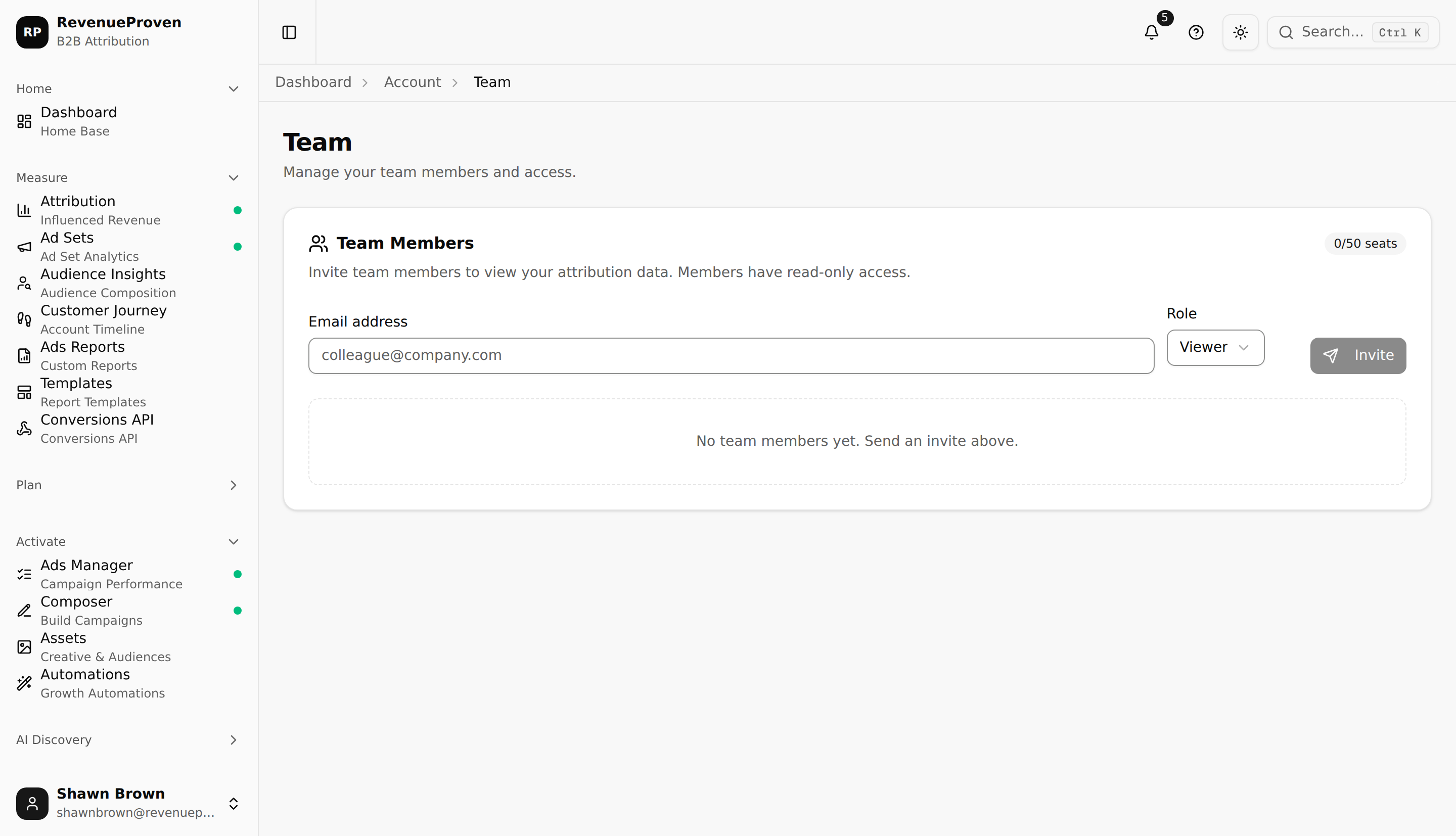 Team management screen showing invite form and existing member list